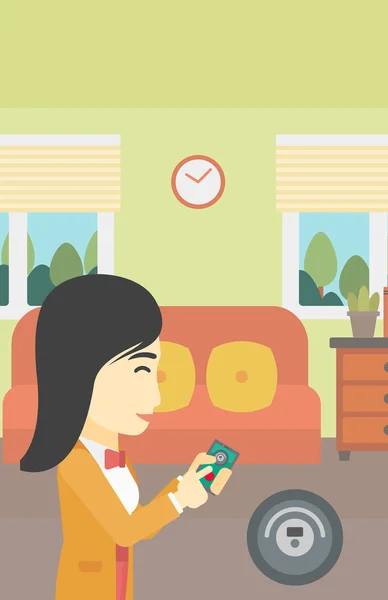 Mujer controlando aspiradora con smartphone . — Vector de stock