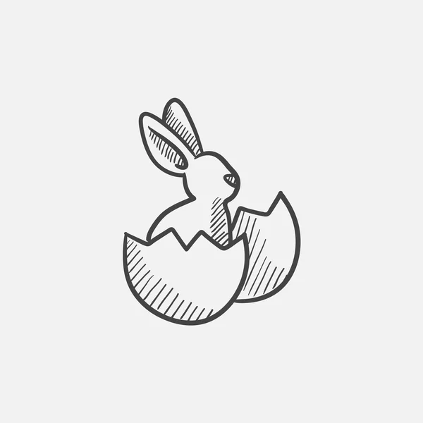 Easter bunny sitting in egg shell sketch icon. — Stock Vector