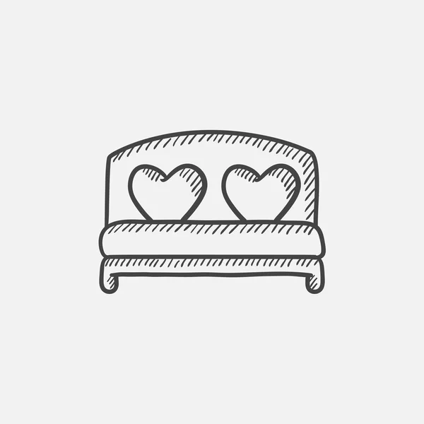 Heart shaped pillows on bed sketch icon. — Stock Vector