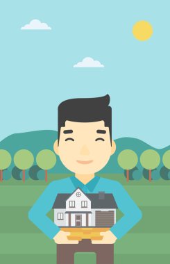 Adam tutan ev modeli vektör illüstrasyon.