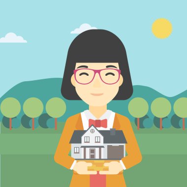 Woman holding house model vector illustration.