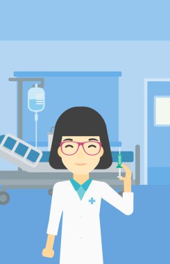 Doktor hastane koğuşunda şırınga.