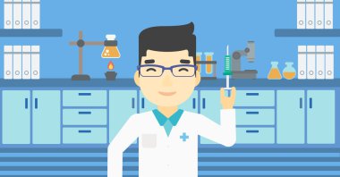 Laboratuvarda şırınga ile laboratuvar asistanı.