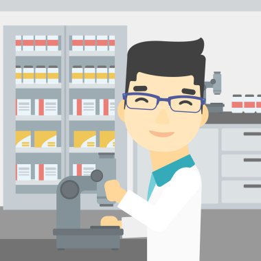 Laboratuar asistanı ile mikroskop.