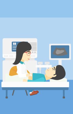 Ultrason muayenesi sırasında hasta.