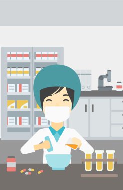 Eczacı ilaç hazırlıyor.