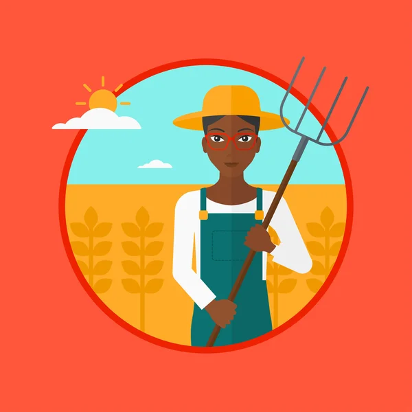 Αγρότης με δίκρανο σε χωράφι σιταριού. — Διανυσματικό Αρχείο