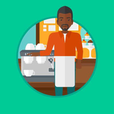 Barista ayakta yakınındaki kahve makinesi.