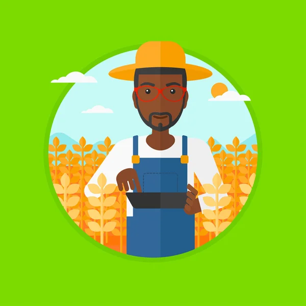 Agriculteur avec ordinateur tablette sur le terrain . — Image vectorielle