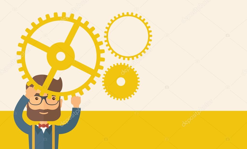 Businessman holding up gears