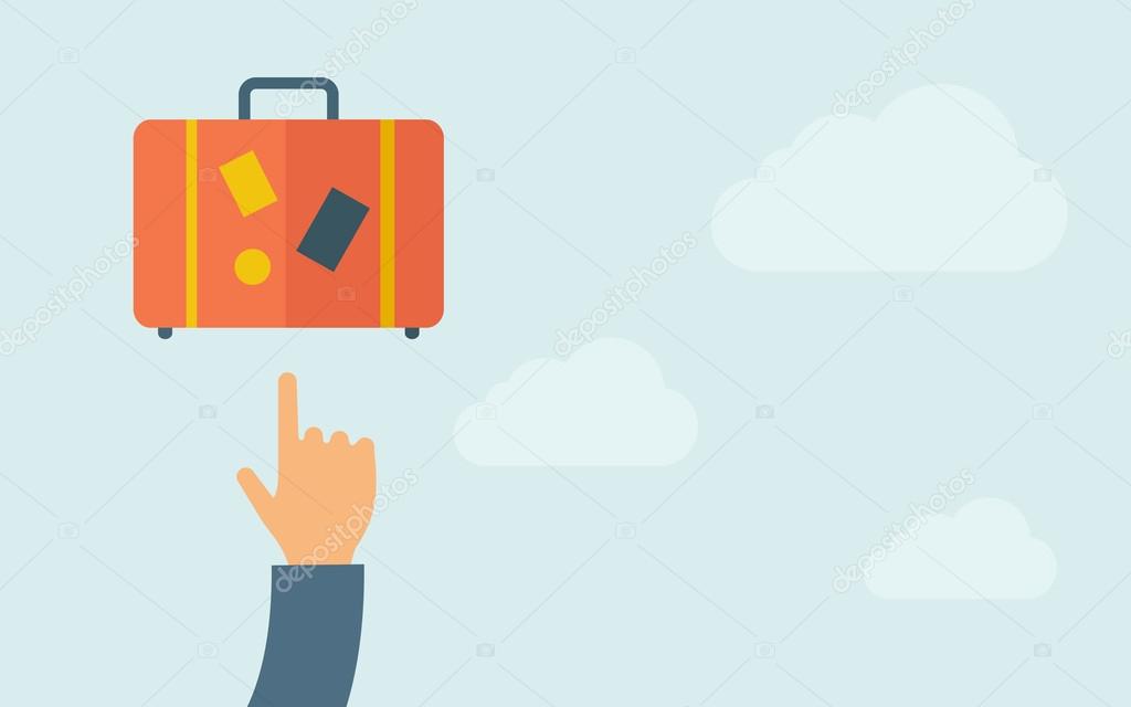 Hand pointing to  luggage