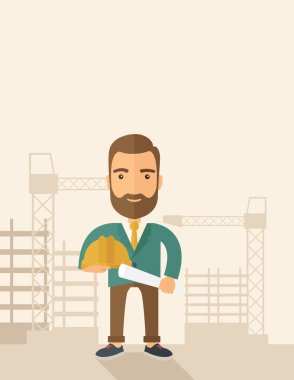 Genç inşaat işçisi kask ve plan holding.