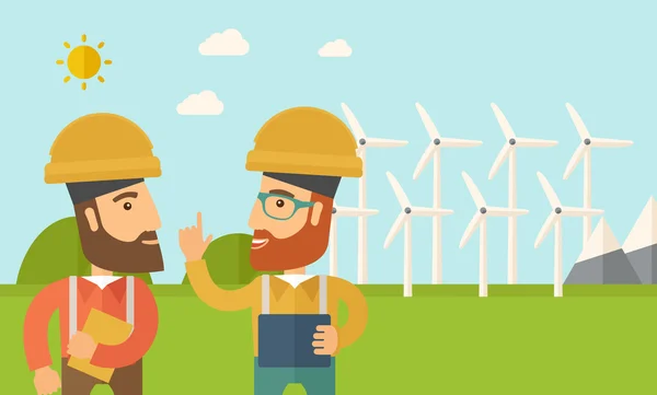 Dos trabajadores hablando frente a molinos de viento . — Vector de stock