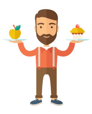 adam onun iki eli cupcake ve elma ile taşır.