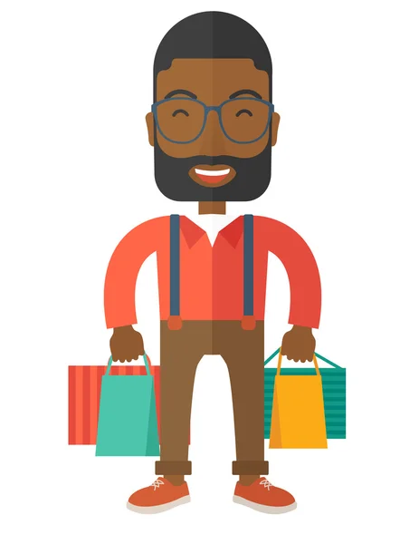 Funny black businessman with shopping bags — Stock Vector