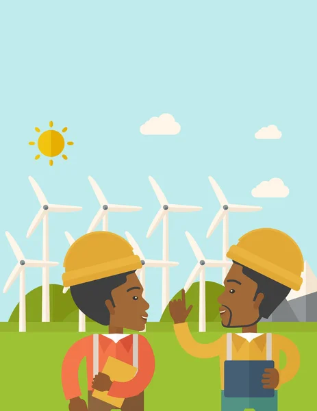 Dos trabajadores negros hablando frente a molinos de viento . — Vector de stock