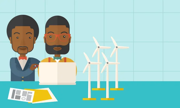 Dois trabalhadores negros usando laptop com moinhos de vento . — Vetor de Stock