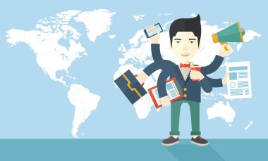 Young but happy japanese employee doing multitasking office tasks.