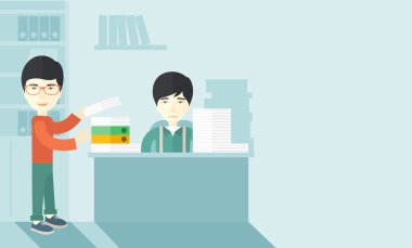 Two asian office clerk inside the office.