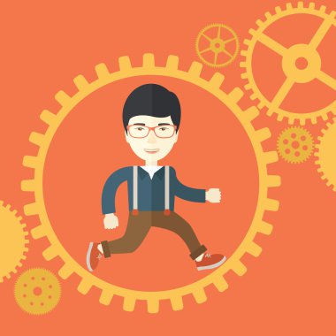 Japanese man running inside a gear.