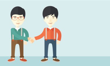 Two asian guys happily handshaking. clipart