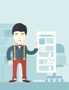 Man happy standing inside his office.