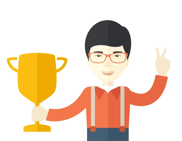 Asian man standing while holding his trophy. — Stockvector