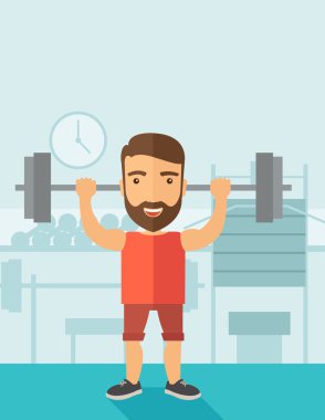 Halter kaldıran yakışıklı adam.