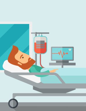 Patient in hospital bed being monitored