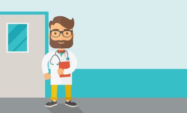 Young male doctor standing with stethoscope.