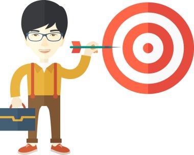 Working chinese man holding a target arrow 