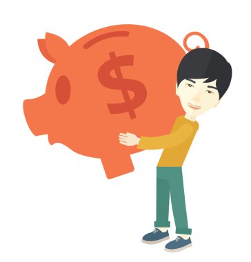 Chinese businessman carries a big piggy bank for saving money.