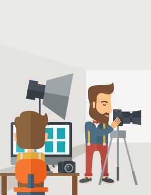 Photography studio with a light set up and white backdrop