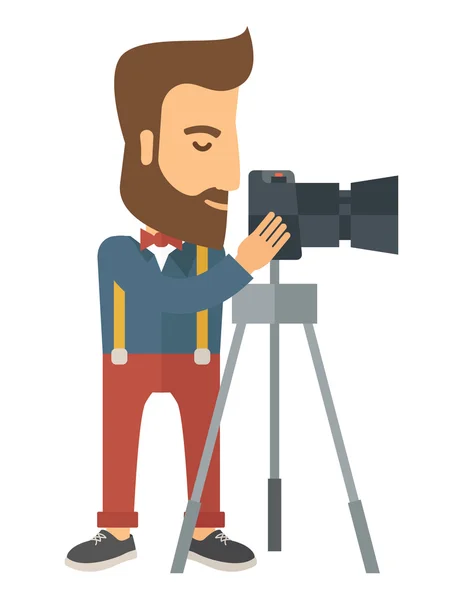 Photographer Standing preparing his camera with tripod. — Stock Vector