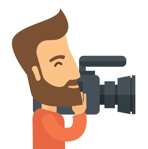 Videographer with his video camcorder — Stock Vector