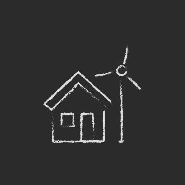 House with windmill icon drawn in chalk.
