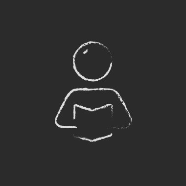 Man reading a book icon drawn in chalk.
