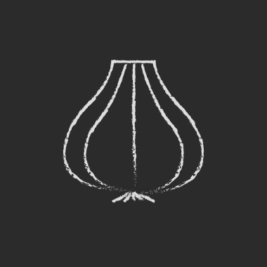 Tebeşirle çizilmiş sarımsak simgesi.