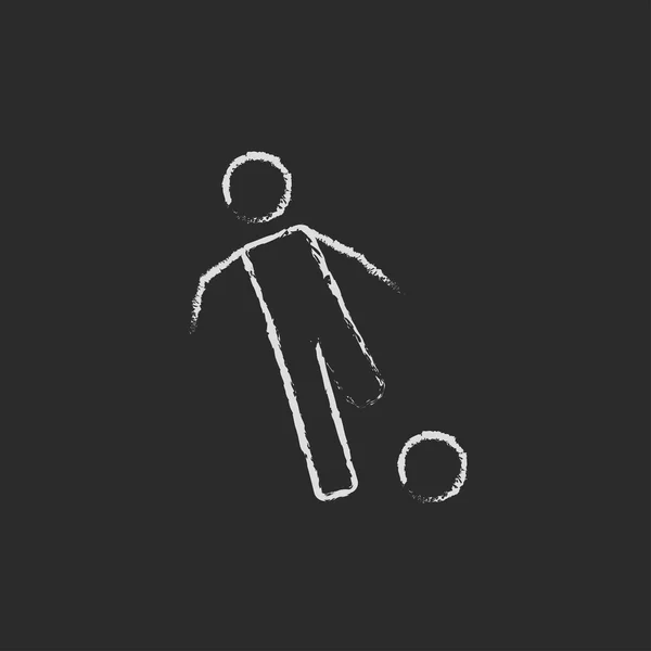 Jogador de futebol com ícone de bola desenhado em giz . — Vetor de Stock