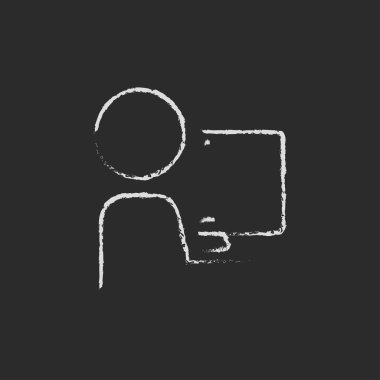 Man working at his computer icon drawn in chalk.