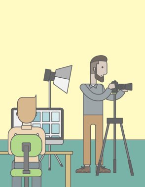 Photographers in studio.
