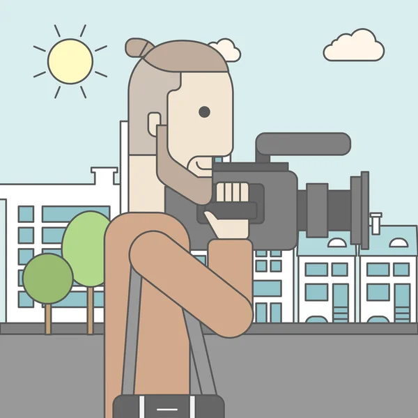 Cameraman with video camera — Stock Vector