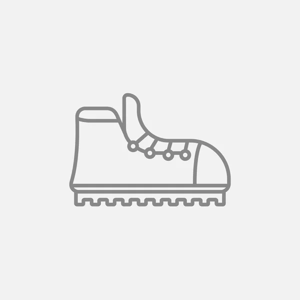 Bota de senderismo con crampones icono de línea . — Vector de stock