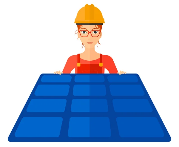 Constructor met zonnepaneel. — Stockvector