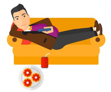 Man lying on sofa with junk food.