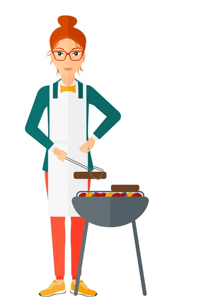 Mulher preparando churrasco . — Vetor de Stock