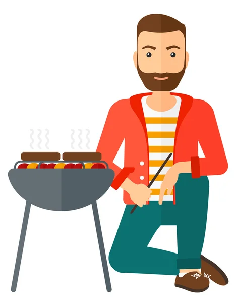 Mann bereitet Grill zu. — Stockvektor