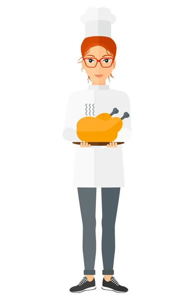 Woman holding roasted chicken. — Stockvector