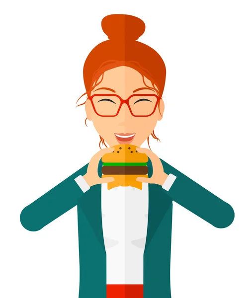 Donna che mangia hamburger . — Vettoriale Stock