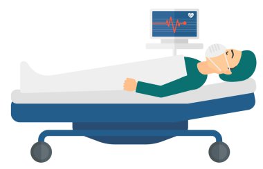 Patient lying in bed with heart monitor.